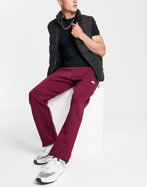 Tech Fleece joggers in dark red | ASOS