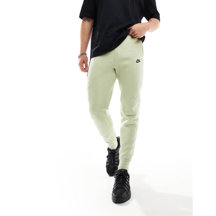 Nike Tech Fleece joggers in light green ASOS