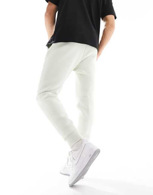 Nike tech joggers online white