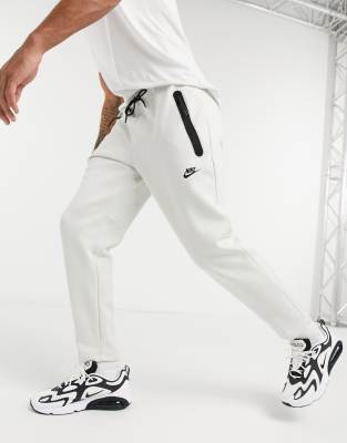 Nike Tech Fleece joggers in off white 