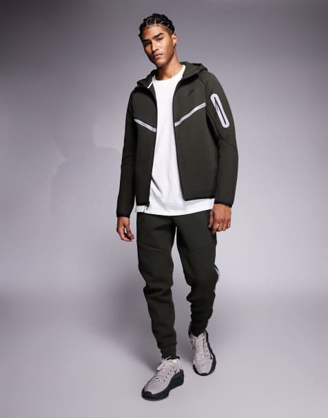 Nike – Tech Fleece – Kapuzenjacke und Jogginghose in Dunkelgrün mit reflektierenden Details und Reißverschluss - view 1