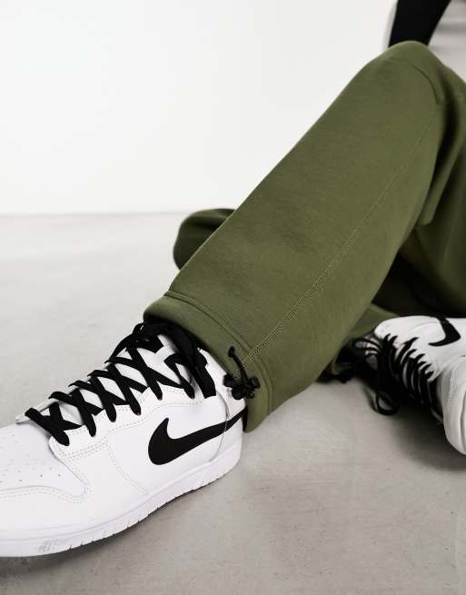 Nike Tech Fleece Loose Fit joggers With toggle in Green for Men