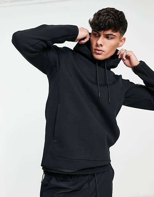 Nike Tech Fleece overhead hoodie in black | ASOS