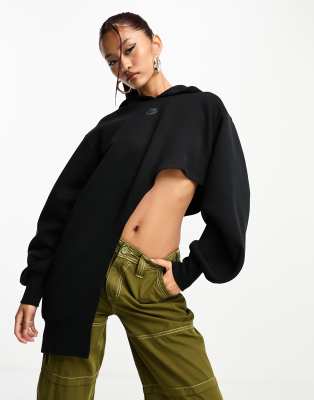 NIKE TECH FLEECE OVERSIZED ASYMMETRICAL HOODIE IN BLACK