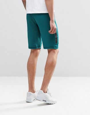 nike tech fleece shorts green