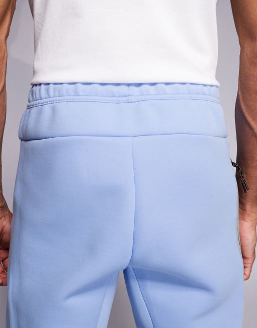 Nike Tech Fleece reflective joggers in light blue | ASOS
