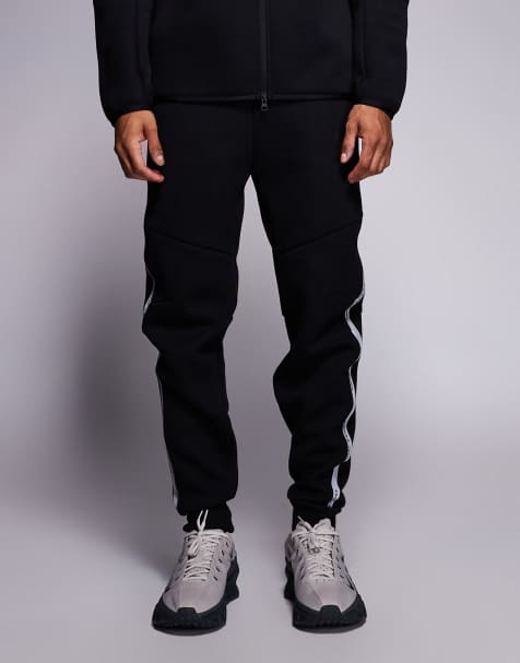 Nike Tech Fleece reflective sweatpants in black - view 1