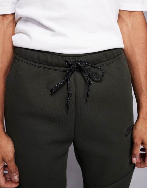 Nike Tech Fleece reflective sweatpants in dark green, 4 of 5