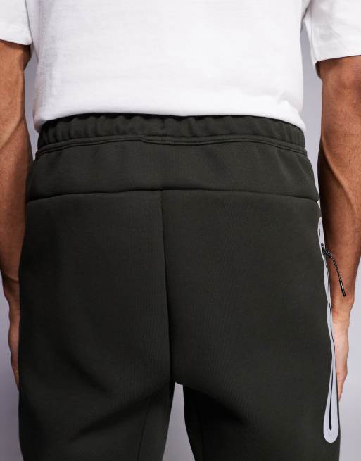 Nike Tech Fleece reflective sweatpants in dark green