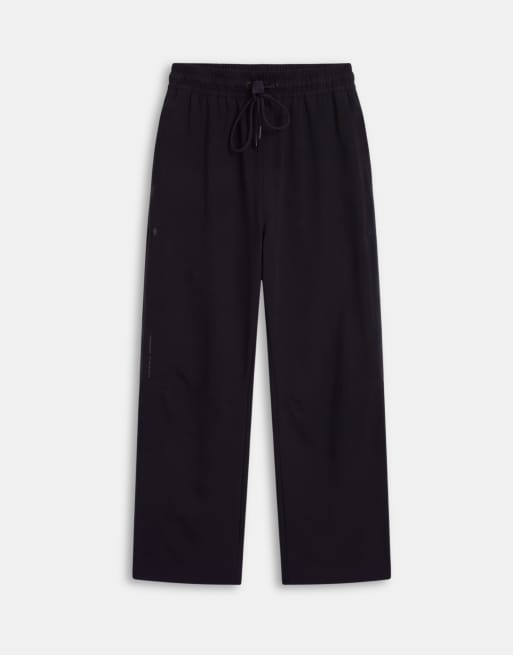 Nike Tech Fleece Shori vida joggers i svart, 6 av 9
