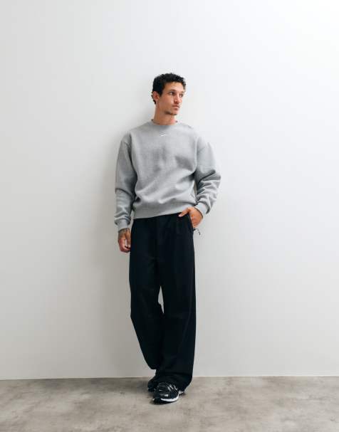 Nike Tech Fleece Shori wide leg joggers in black - view 1