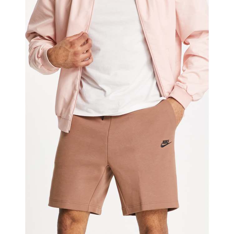 Nike tech fleece shorts hot sale pink