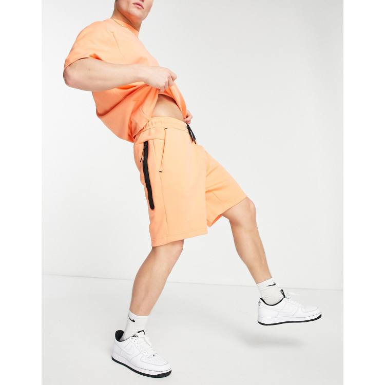 Orange nike fleece clearance shorts