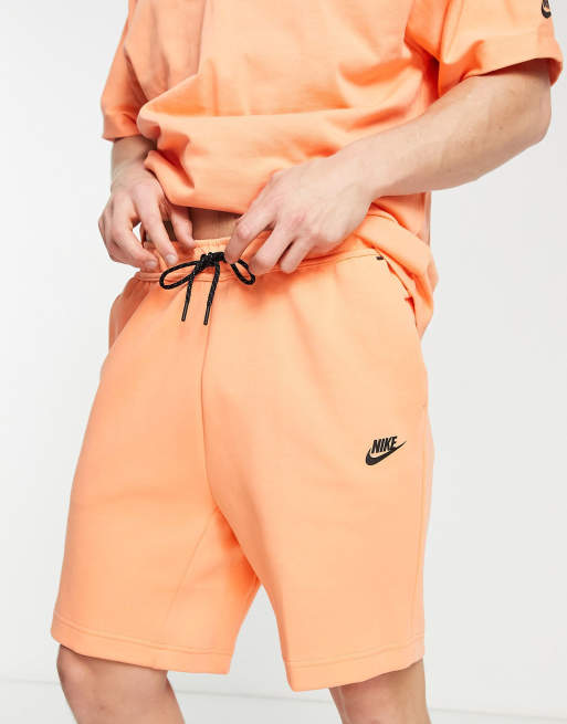 Nike fleece store shorts orange