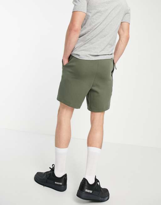 Nike tech clearance fleece shorts green