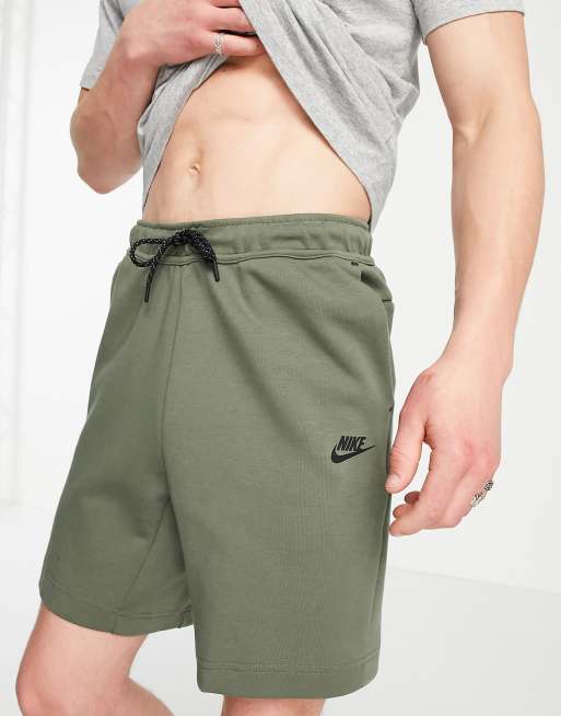 Nike Tech Fleece shorts in green ASOS