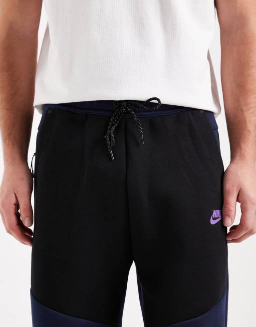 Nike - Tech Fleece - Sorte/marineblå joggingbukser med åben kant, 4 af 5