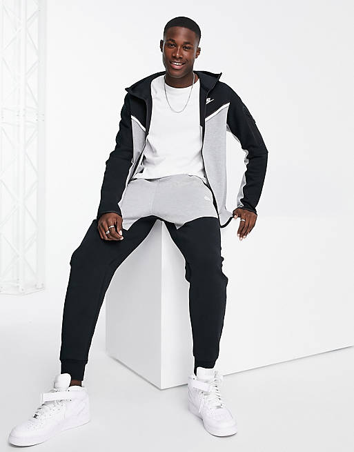 Nike Tech Fleece sweatpants in black and gray color block - BLACK | ASOS
