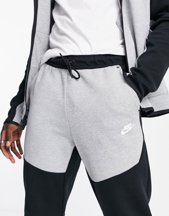 https://images.asos-media.com/products/nike-tech-fleece-sweatpants-in-black-and-gray-color-block-black/203237656-3?$n_550w$&wid=550&fit=constrain