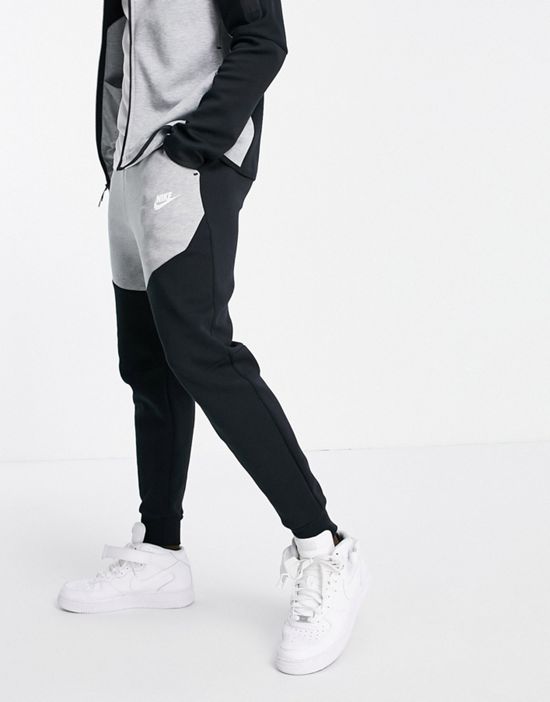 https://images.asos-media.com/products/nike-tech-fleece-sweatpants-in-black-and-gray-color-block-black/203237656-4?$n_550w$&wid=550&fit=constrain