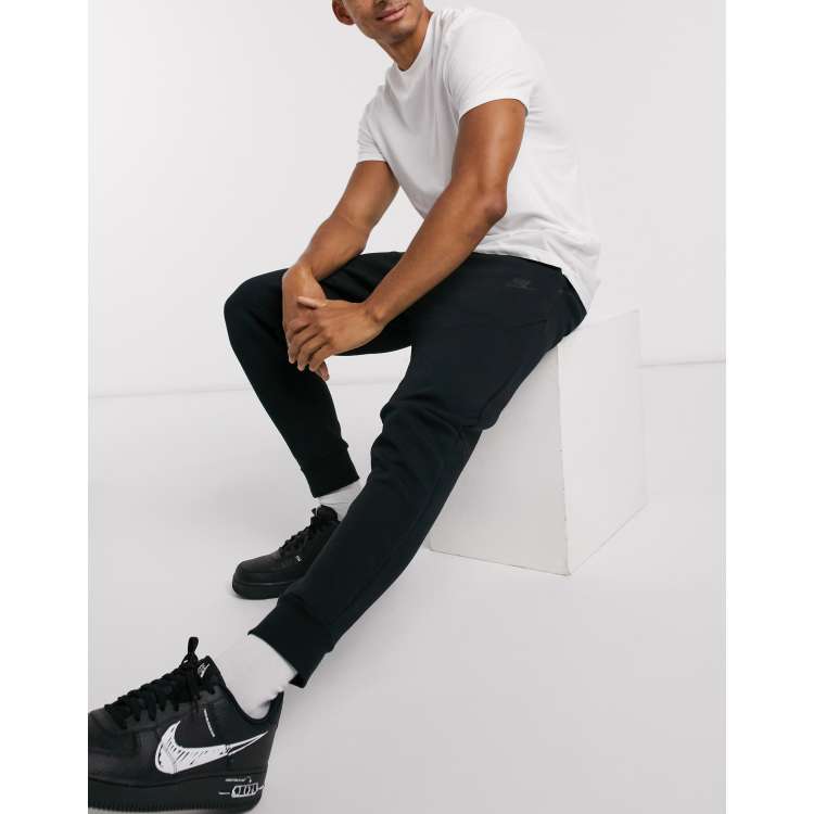 nike tech joggers black and white