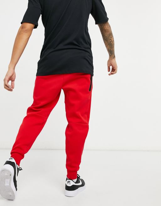 Red nike tech discount joggers