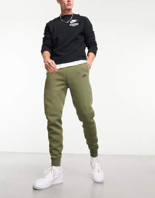 Green nike tech fleece pants hot sale