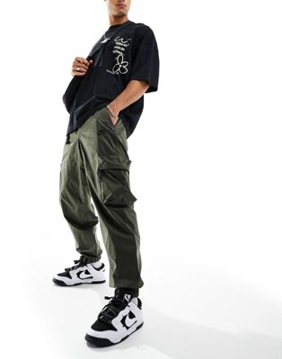 Nike Tech Fleece woven cargo trousers in dark green - ASOS Price Checker