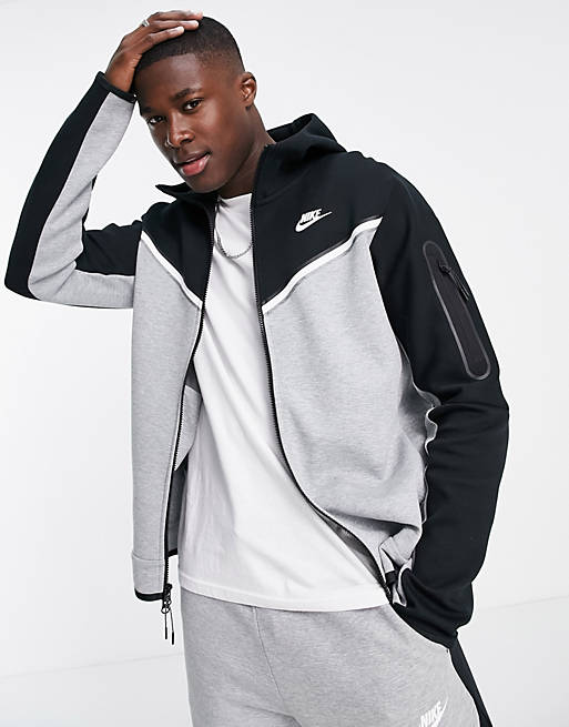 sensor Schandalig Spit Nike Tech Fleece zip hoodie in black and gray colorblock | ASOS