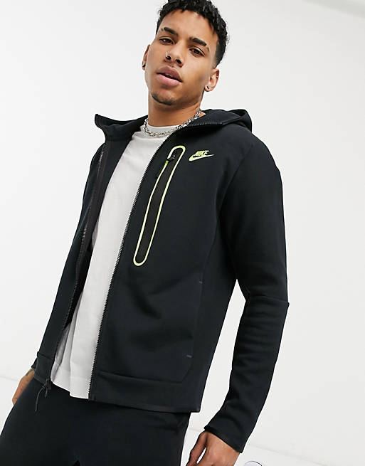 Nike Tech Fleece zip-through hoodie in black/volt | ASOS