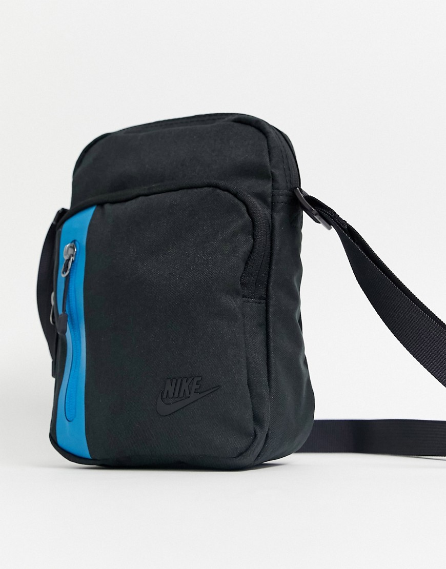Nike Tech flight bag in black with blue zip
