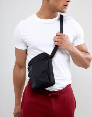 Nike Tech flight bag in black | ASOS