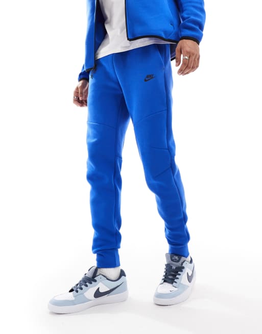 Blue nike tech joggers on sale