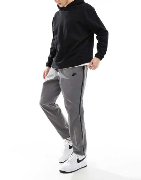 Nike Tech – Odblaskowe spodnie z tkaniny w srebrnym kolorze - view 1