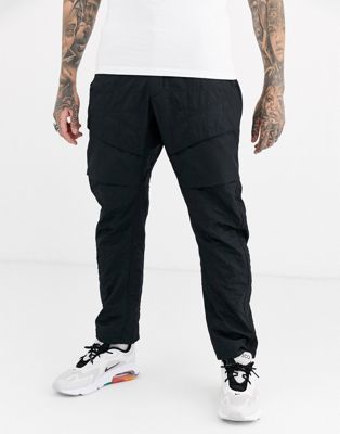 Nike Tech Pack utility trousers in black | ASOS
