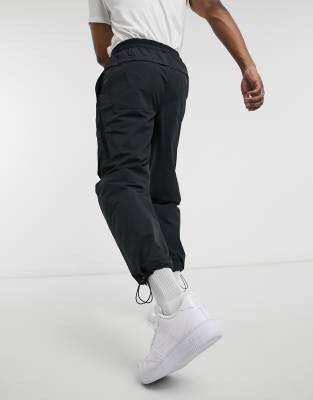 nike woven cargo track pants