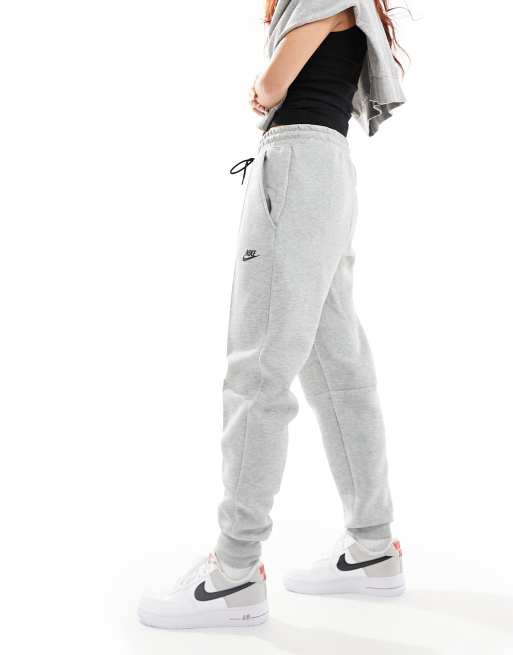 Nike Pantalon de jogging en polaire pour femme (gris foncé/blanc, taille  M), BLANC : : Mode