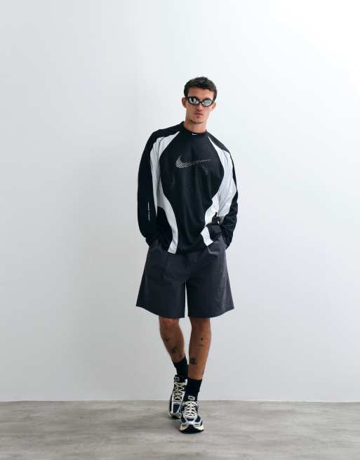 Nike Tech perforated central swoosh logo long sleeve top in black and white, 2 of 5