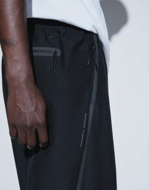 Nike Tech Shori perforated wide leg joggers in black, 4 of 5