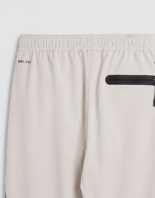 Nike Tech Shori perforated wide leg joggers in light beige, 8 of 9