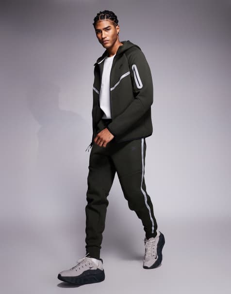 Nike Tech - Tech Fleece - Joggers in pile tecnico color verde scuro con dettagli riflettenti - view 1