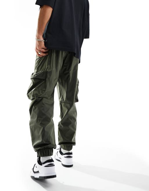 Nike Tech woven cargo trousers in dark green