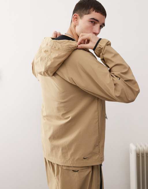 Nike tech woven jacket in beige | ASOS