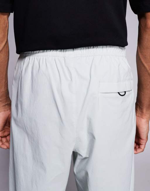 Nike Tech Woven joggers in light grey, 5 of 5
