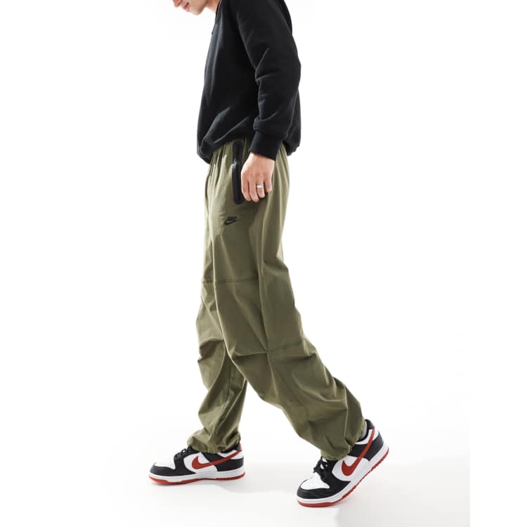Nike Tech Woven oversized pants in khaki | ASOS