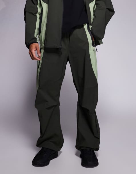 Nike Tech Dri-FIT Woven oversized joggers in dark green