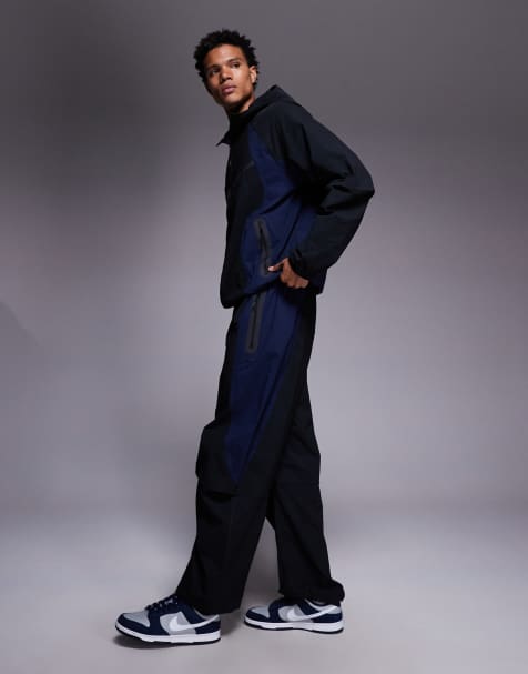 Nike Tech Woven Pro tracksuit in black and blue - view 1