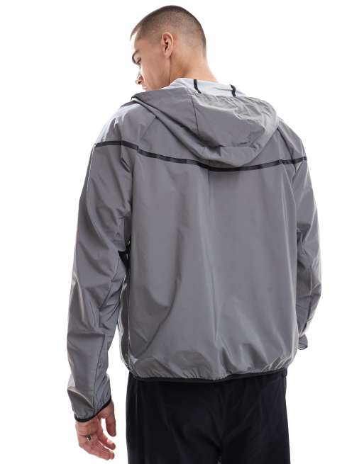 Nike Tech Woven reflective jacket in silver ASOS