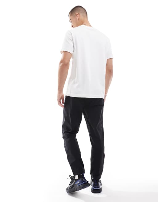 Nike Tech Woven tapered pants in black