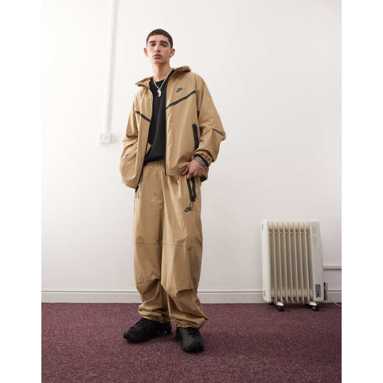 Nike Tech woven trouser in beige | ASOS